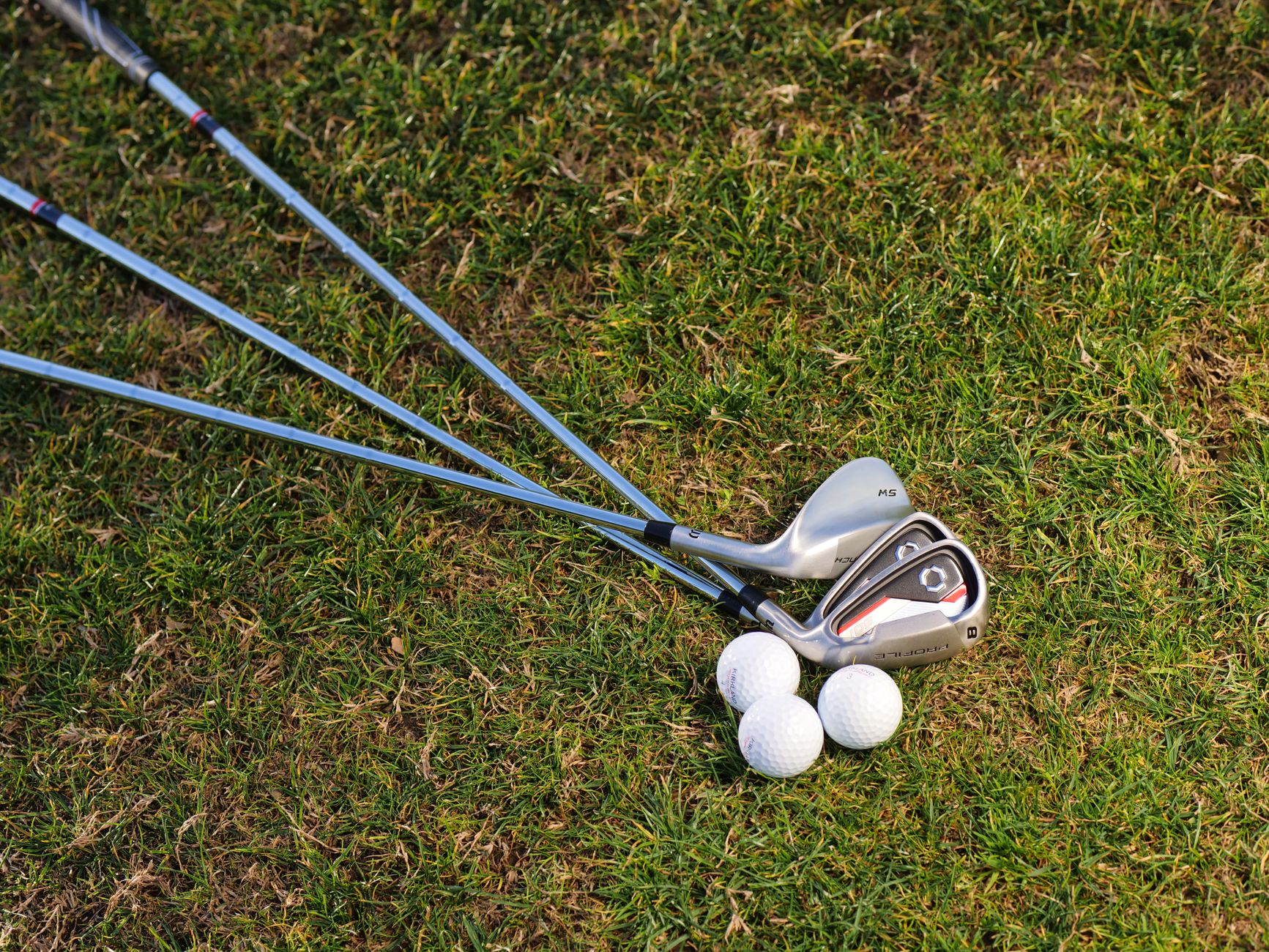 Golf balls on green grass