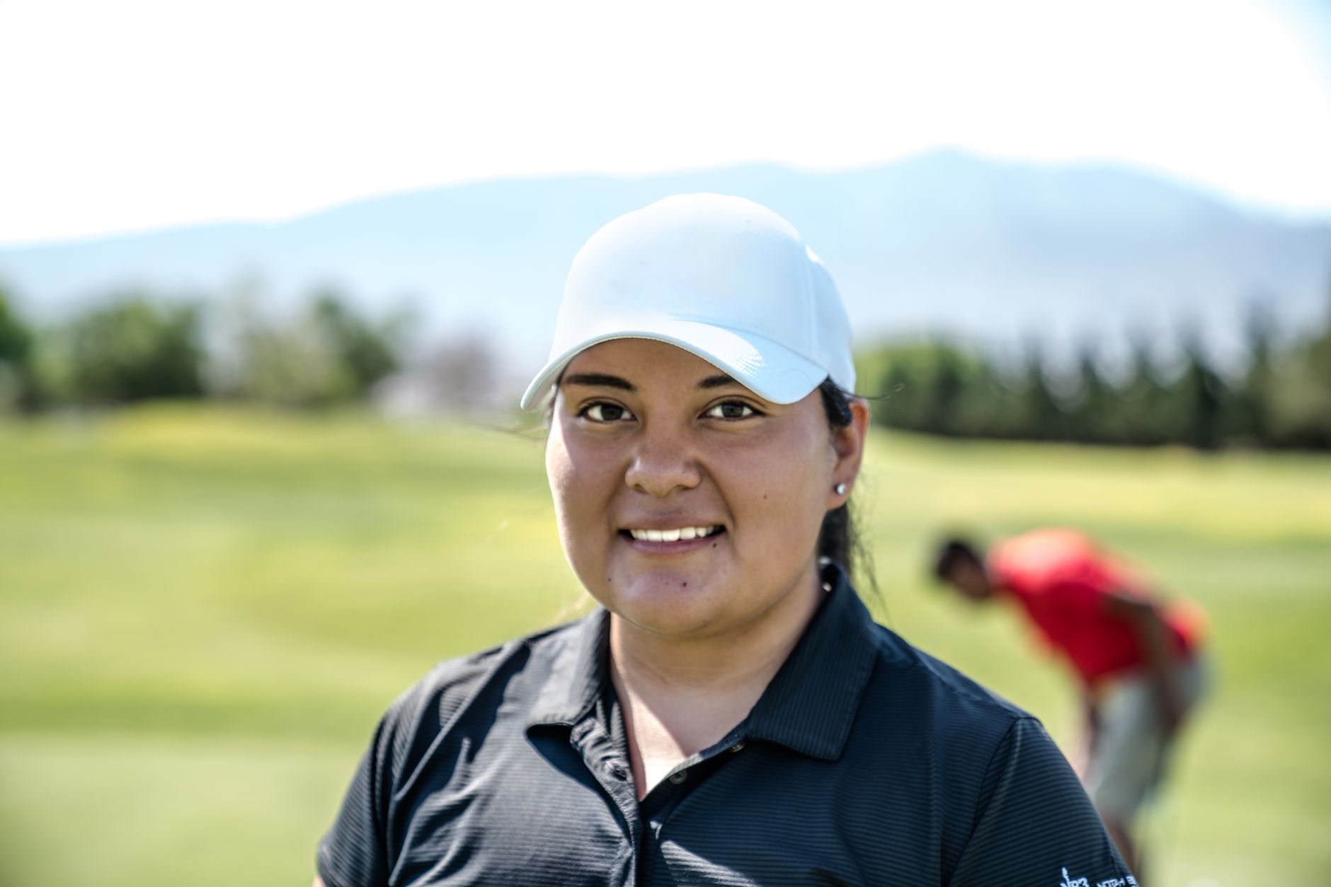 Woman golfer in professional attire
